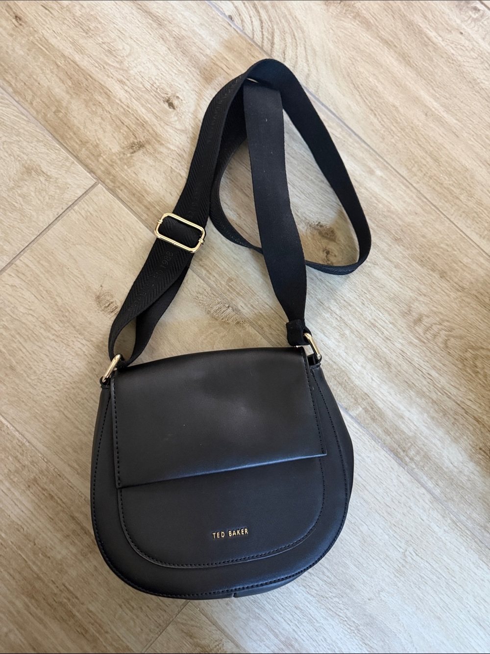 Ted Baker Black Crossbody Saddle Bag with Gold Accents